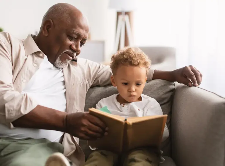 parent reading to his child